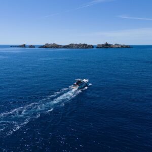 Private boat tour cruising toward Grebeni Island near Dubrovnik on the Adriatic Sea.